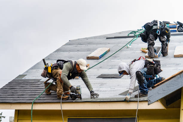 Professional Gutter Installation technician working in Parker, KS
